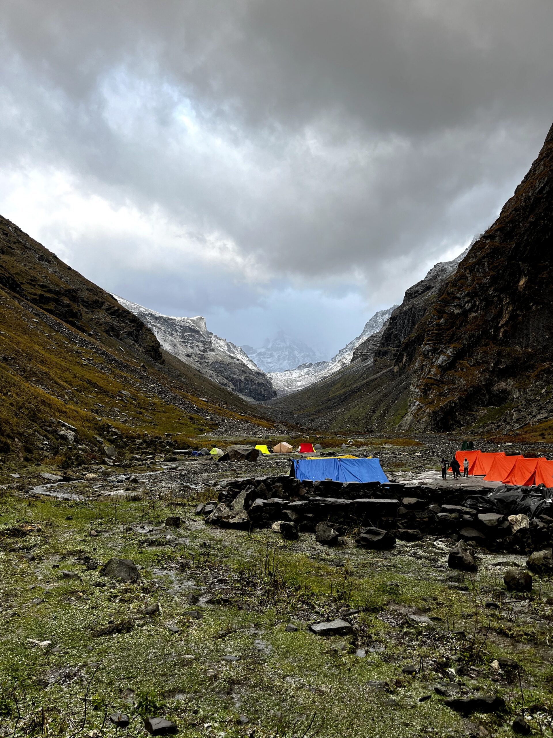 Hampta Pass Trek campsite in a Himalayan mountain valley