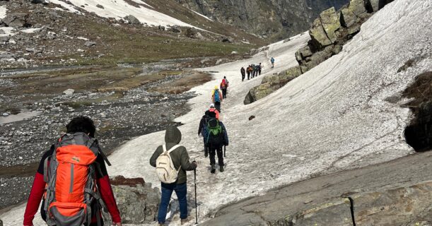 A group of people trekking together