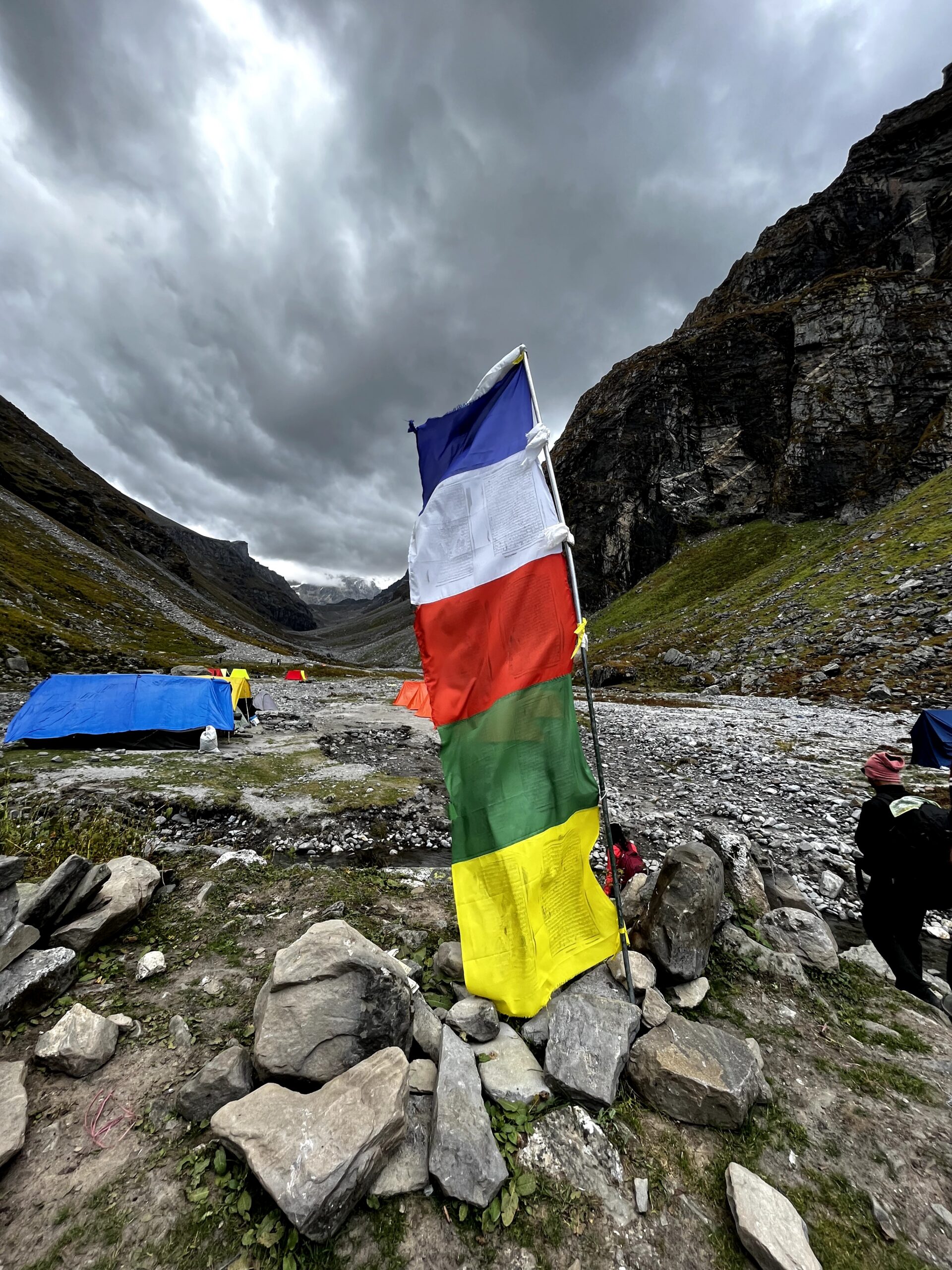 Hampta Pass Trek campsite in a Himalayan mountain valley