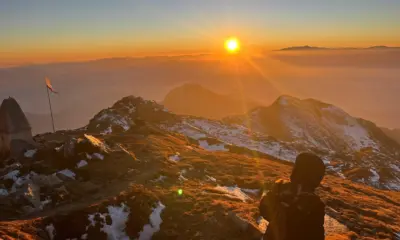 Golden sunrise over the Himalayas seen from the Kedarkantha summit.