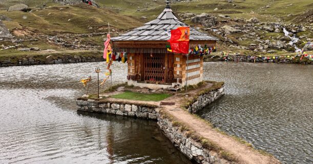 Sacred Krishna temple standing in the middle of Yulla Kanda Lake surrounded by Himalayan mountains